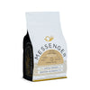 Messenger Coffee White Box with light gold label featuring Rodrigo Sanchez Pink Bourbon Washed on a white background